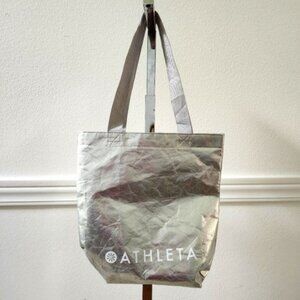 Athleta silver reusable bag. Metallic silver with grey/silver nylon stra…